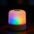 Aurevia Prism 16 colour table lamp glowing at night