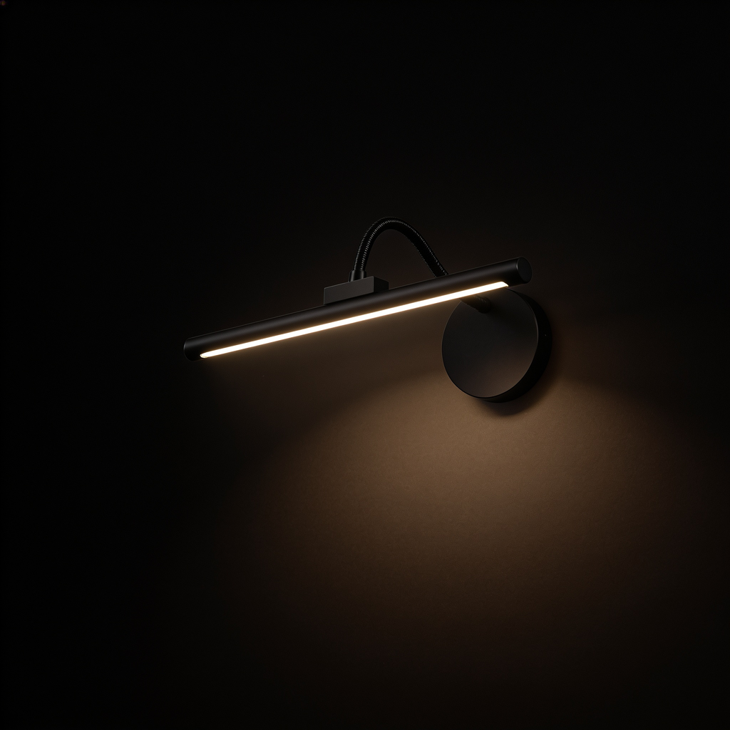 The Pivot picture light on a black studio background, showing the slim bar, gooseneck arm and round wall mount